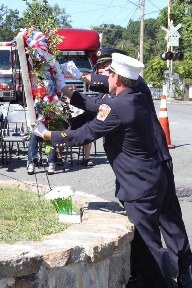 Flower placed for Leo Weishhaar by Matt Bowler. Flower placed for Carmine Albero by Todd Giraudin.

Memorial Service NFD. September 9, 2012. Photo by Vincent P. Tuzzolino